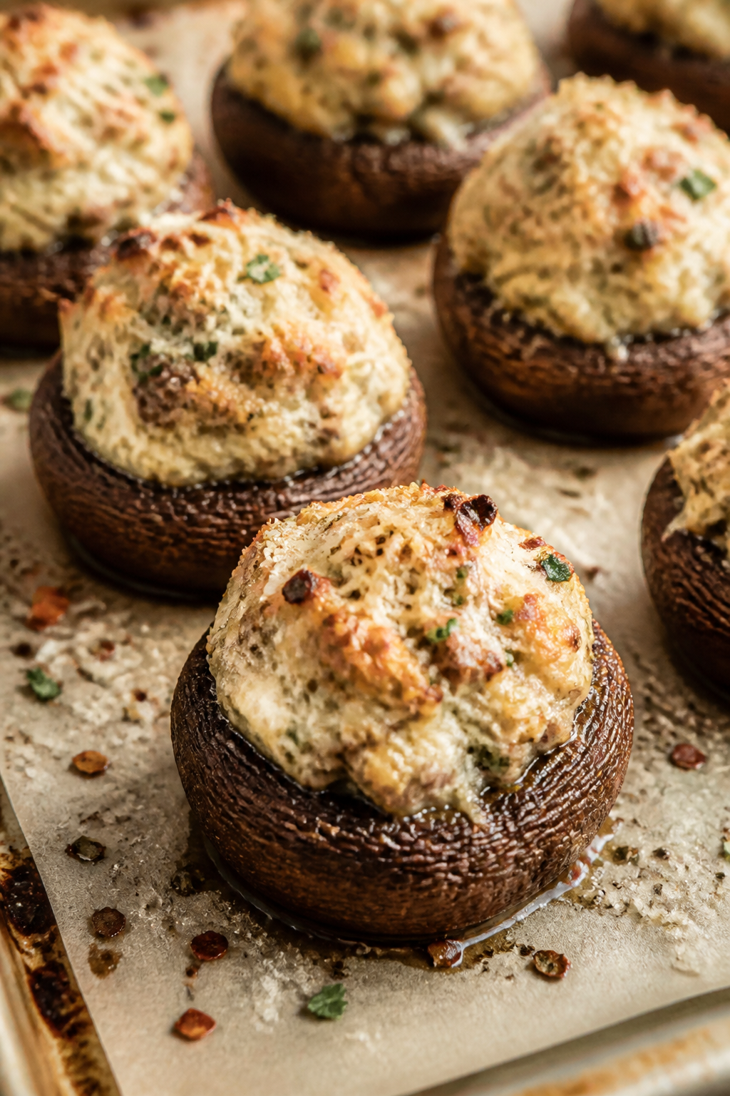 Close-up detail shot of freshly baked ground turkey and cream cheese stuffed mushrooms just out of t