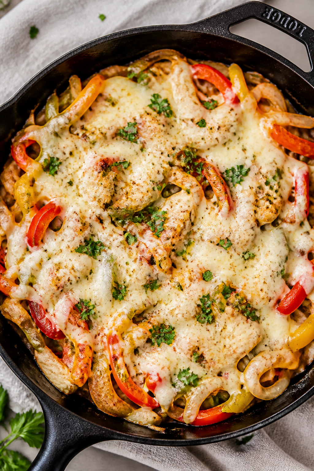 Gooey cheese melt moment: Overhead shot of the turkey–pepper–onion mixture in the skillet, provo