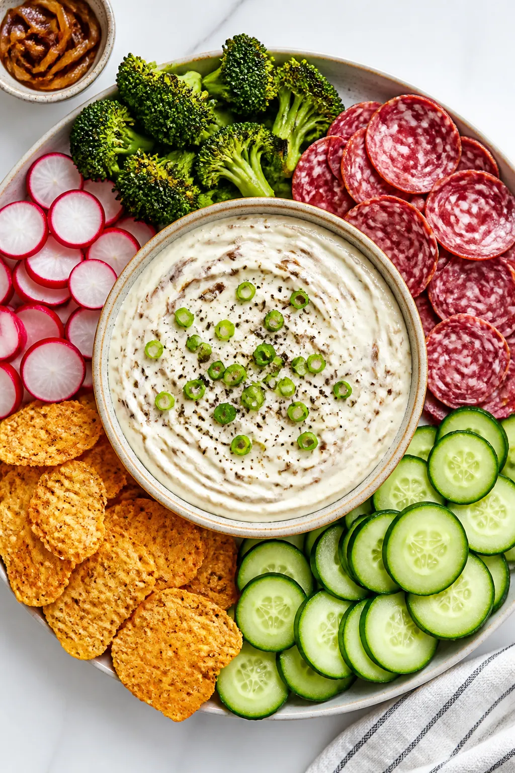 Tasty overhead platter: Top-down shot of a chilled bowl of Keto French Onion Dip with visible creamy